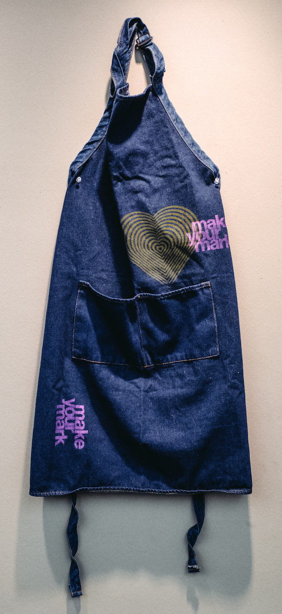 MAKE YOUR MARK denim studio apron with screenprint heart design